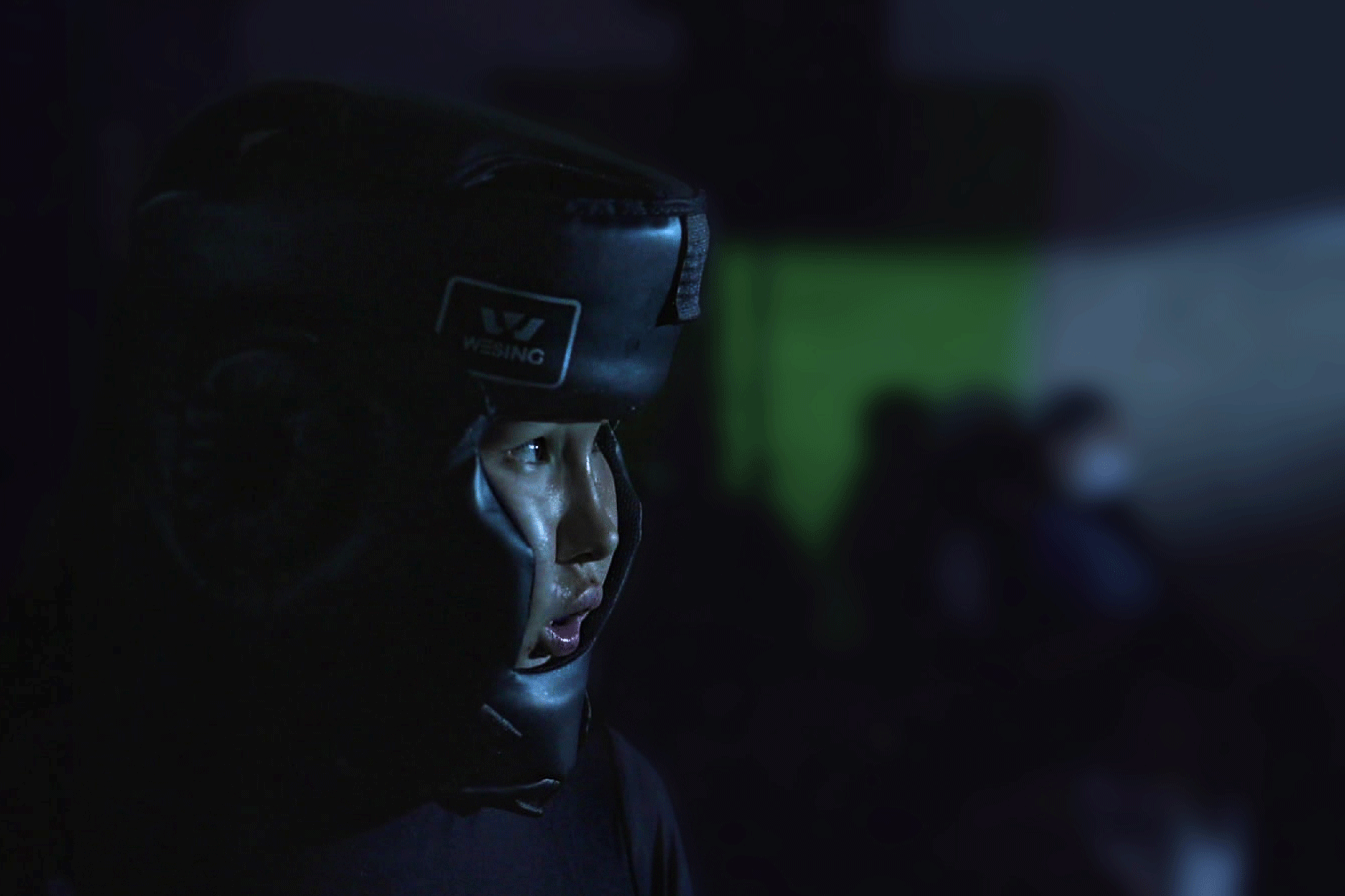 Portrait of a young female boxer 