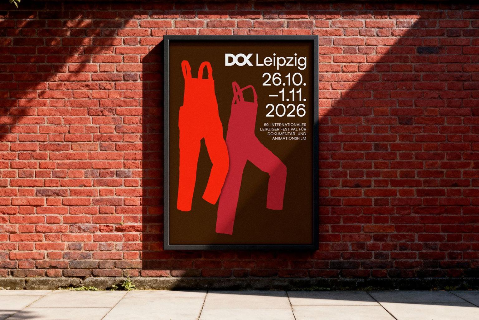 Motif of DOK Leipzig 2026 with two dungarees